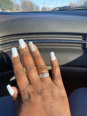 Uneven bland nails with dipping powder on my cuticles