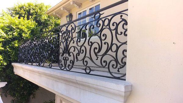 We painted this beautiful iron rod fence