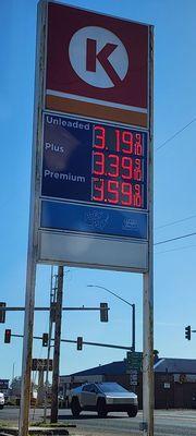 Circle K in Newport sure has low gas prices! Hey it's one of those Elon Musk mobiles! Perfectly framed by chance (8/28/24).