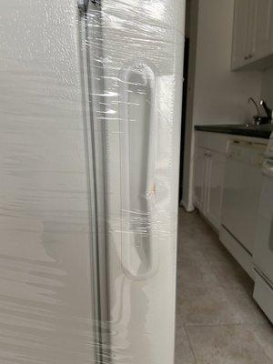 Damaged handle during delivery - completely bent in.