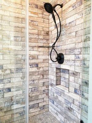 Shower tile renovation. Shower wall decorative subway tiles