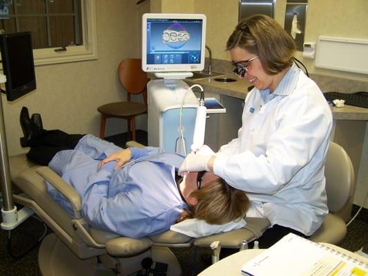 Dr. Romzick designing a porcelain crown to be presented for treatment completion in a single appointment.