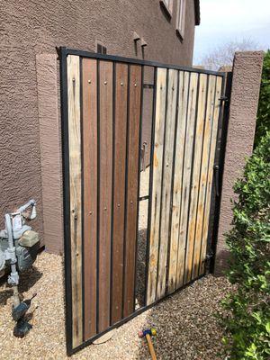 Old gate with some new pickets installed.