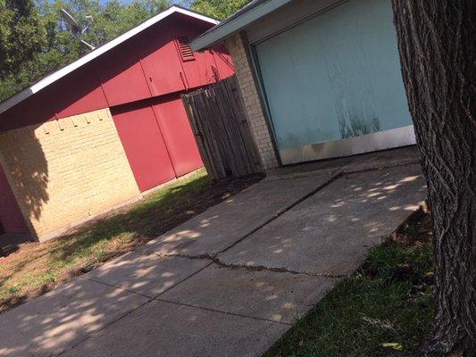 Before close to garage. Added 2' width to drive and a pad in front of the gate.