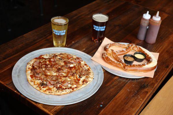 Beer, pizza, pretzel.