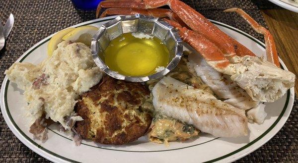 Cod, crab legs, Crab cake and garlic mashed potatoes