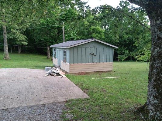 Bottom wood was rotten so replaced with plywood Wrapped it and put lap siding up. 5/20/24