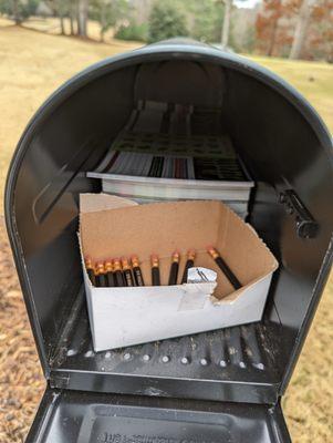 Mailboxes on the course contain scorecards and pencils.