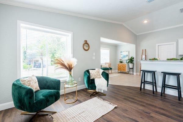 Home staged in Clearwater, this is the dining room, kitchen and entryway.