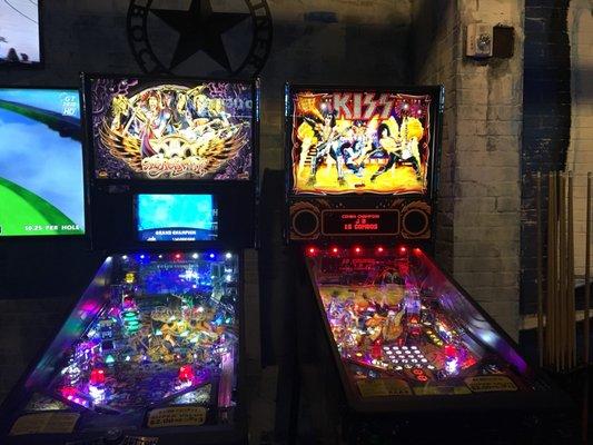 KISS and Aerosmith pinball machines. I got to come back here.