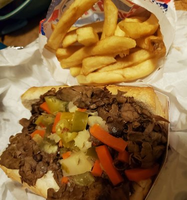 Italian Beef with hot peppers and french fries. Missing: bbq sauce on the fries