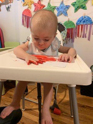 Even babies start working with art materials right away