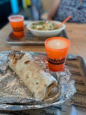 Fajita white chicken freebird burrito with a frozen margarita.