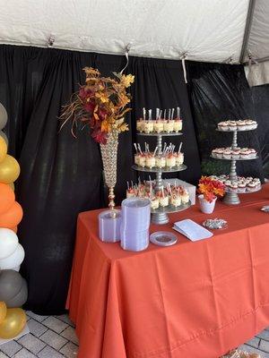 Tent, backdrop drapes and centerpieces