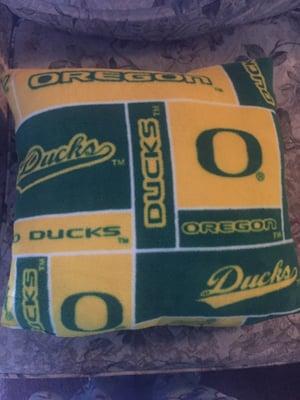 Someone hand-made an Oregon Duck pillow and sold it at Crafter's Alley. I love it!