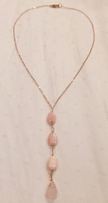 The lovely necklace I made at my wire wrapping class at The Bead Boutique. Rose gold chain, pink coral beads, and a Rose Quartz drop.