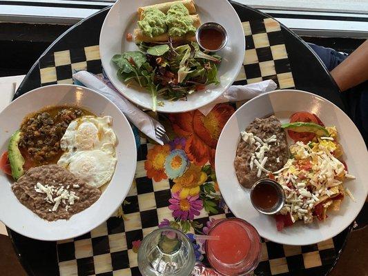 Sirloin steak breakfsst plate with two eggs overeasy, veggie flautas, and migas