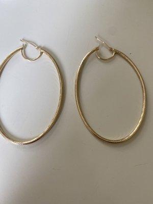 One gold earring was spilt in two sections in one earring