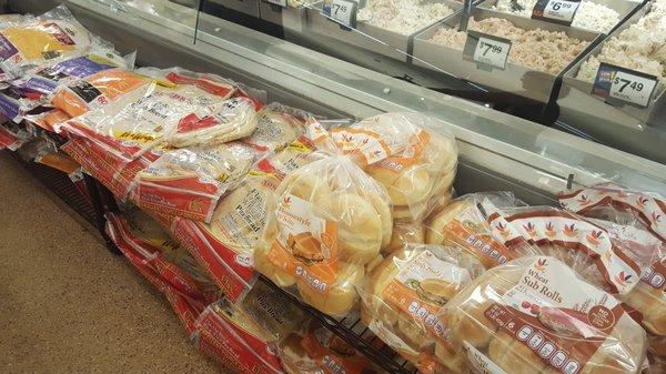 Some of the bread in front of the deli section.