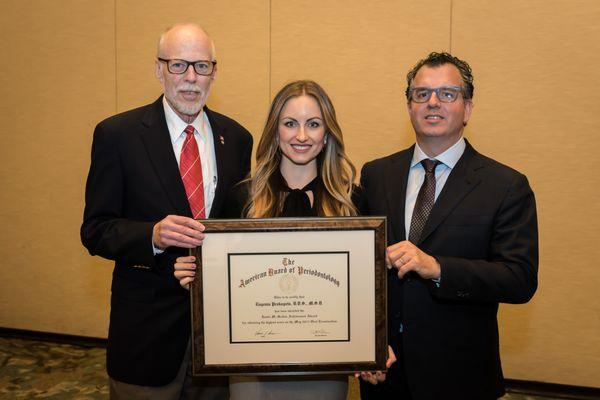 Dr. Prokopets receiving the Leslie M. Salkin Award for obtaining the highest score on the American Academy of Periodontology Board exam.