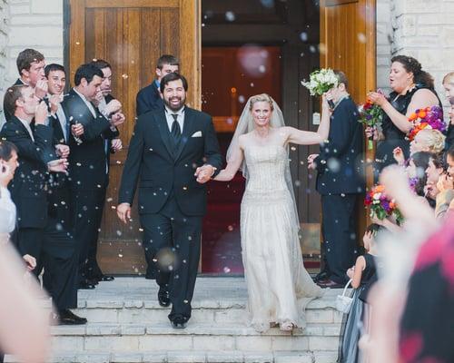 A beautiful bride and groom leaving the chapel!