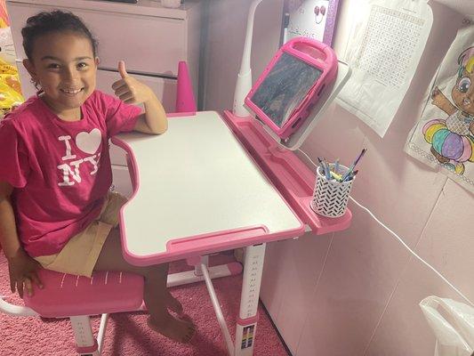 Young girl receiving tutoring services on her tablet.