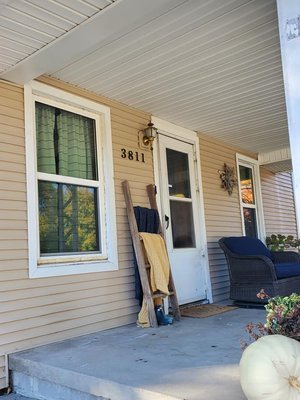 8 new vinyl Gerkin windows, 2 new anderson storm doors for this Lincoln home