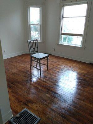 Finished drywall, finished painting, finished floors. Complete living room remodel.