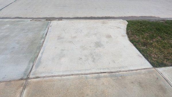 Driveway Pic 3 within 6 of closing.  Not sealed properly. Lots of discoloration and bottom of the barrel concrete used