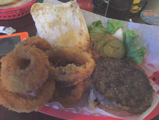 Burger in sourdough bun with awesome onion rings