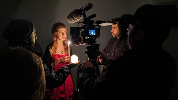 Shooting a scene in the class room by candlelight.