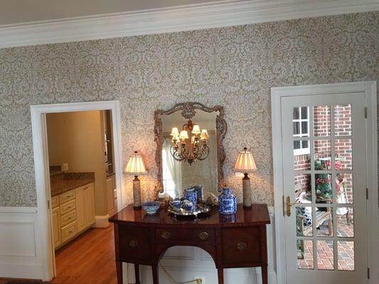 Beautiful Farrow & Ball wallpaper and professional paint job enhance this homes fine architecture