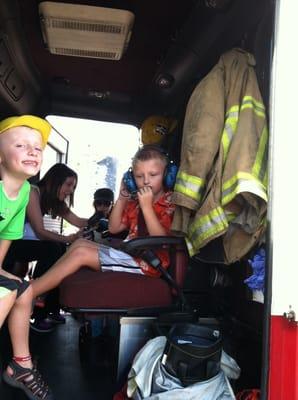 Just a couple of kids in a fire truck...