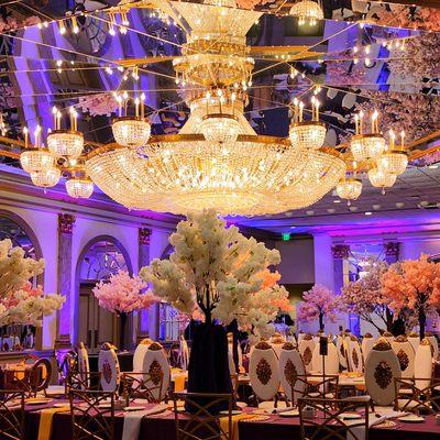 Beautiful event decor under one of our oversized chandeliers.