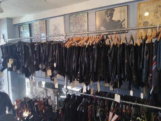 Large inventory of men's leather pants, chaps, vests, and consignment items.