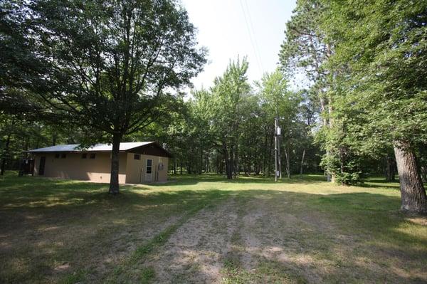 3-season hot shower and bathroom facility for bunkhouse, tent and RV residents.