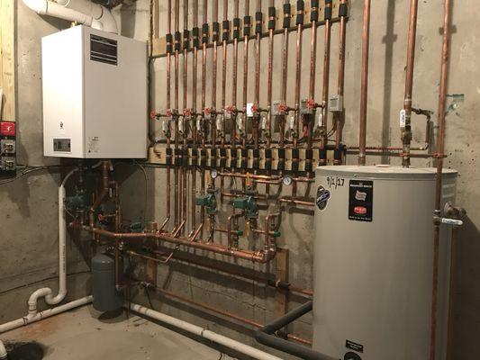 Prestige boiler with Bradford white indirect hot water heater installation.