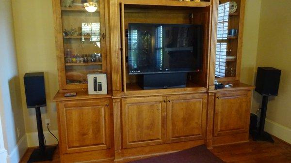 Home theater, TV installation, and custom programmed remote control for ease of use. This was an install by: Grand Central Wiring.