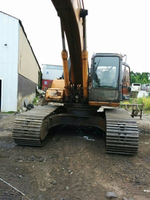 CASE EX290 Claw with an OHIO Magnet attachment to help Sort, Load Trucks, Unload customer vehicle's and keep your tires metal free.