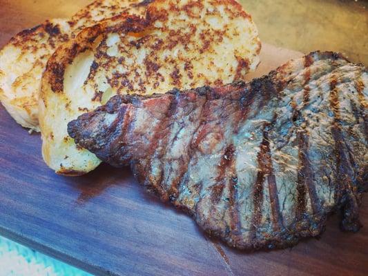 Tender brisket with our famous garlic bread.