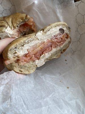 Walnut Raisin Cream Cheese on a cinnamon raisin Bagel (both sides) with nova and tomato