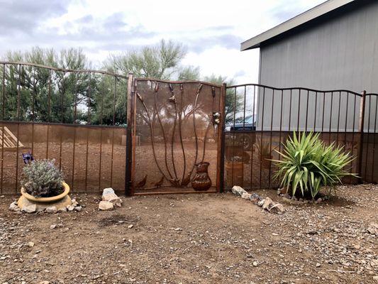 The side gate to our fenced in yard.