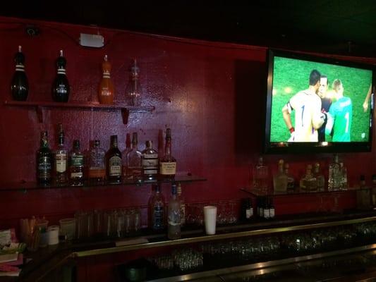 Several flat screens throughout the bar