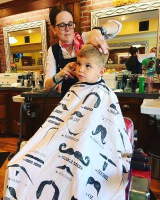 Always one of our favorite stops to get little man's summer cut! We don't trust anyone but Mick and Disney World to cut this kid's hair.