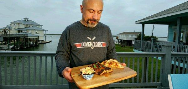 Blackened redfish with cajun slaw and garlic toast