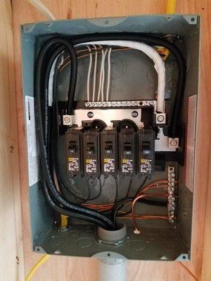 Ran 100 amp underground service cables to detached garage and wired up garage with all new panel and updated wiring.