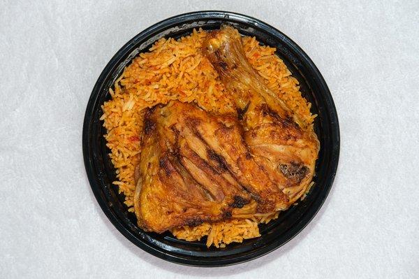 Jollof Rice with Chicken comes with coleslaw and peppered sauce