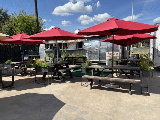 Shaded seating area for dine in.