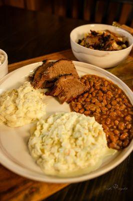 Brisket platters with cowboy beans, coleslaw and potato salad