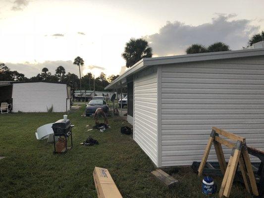 Pan roof shed vinyl siding!